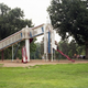 Image for article titled The haunting beauty of abandoned playground rockets